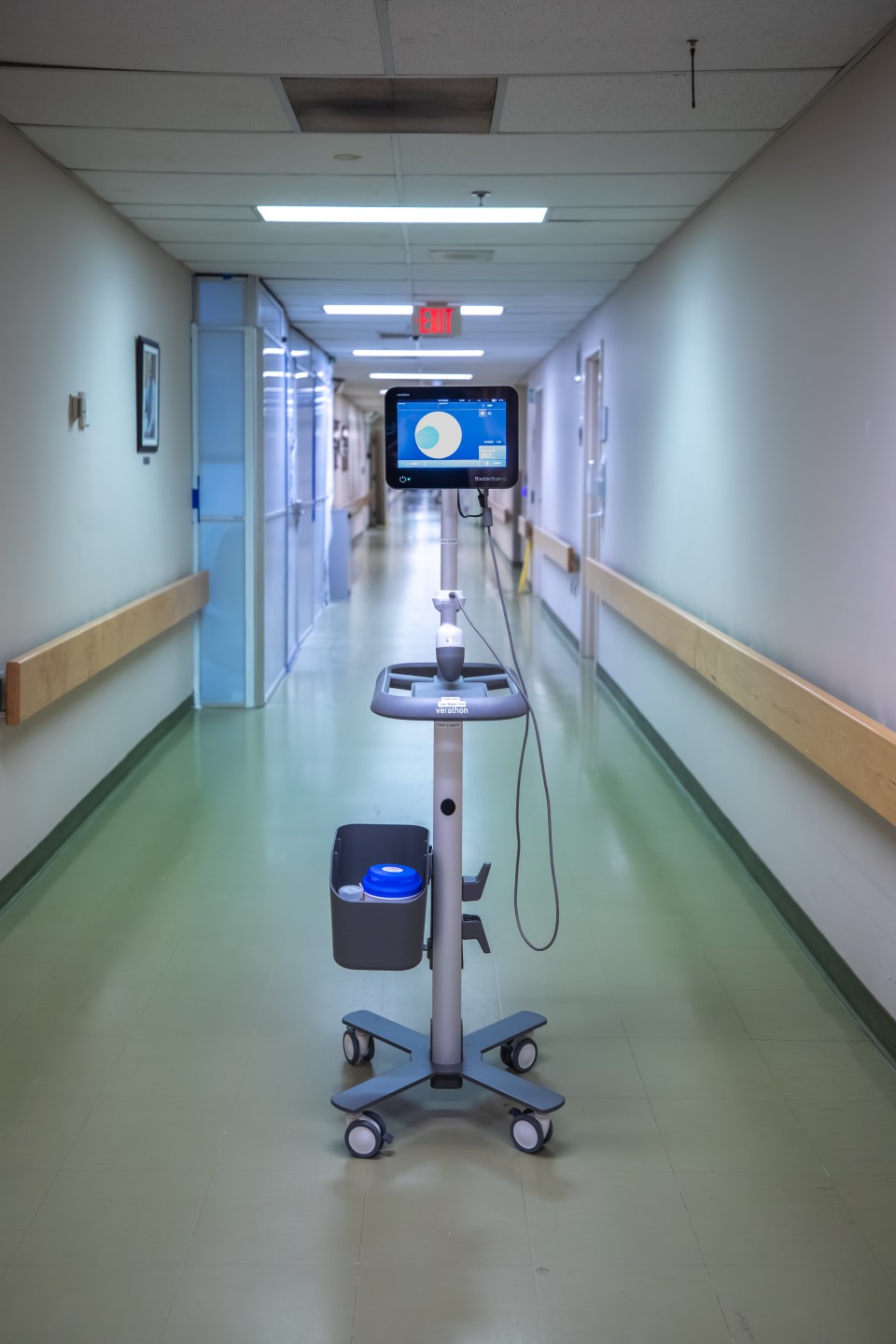 A bladder scanner in the center of a hospital hallway