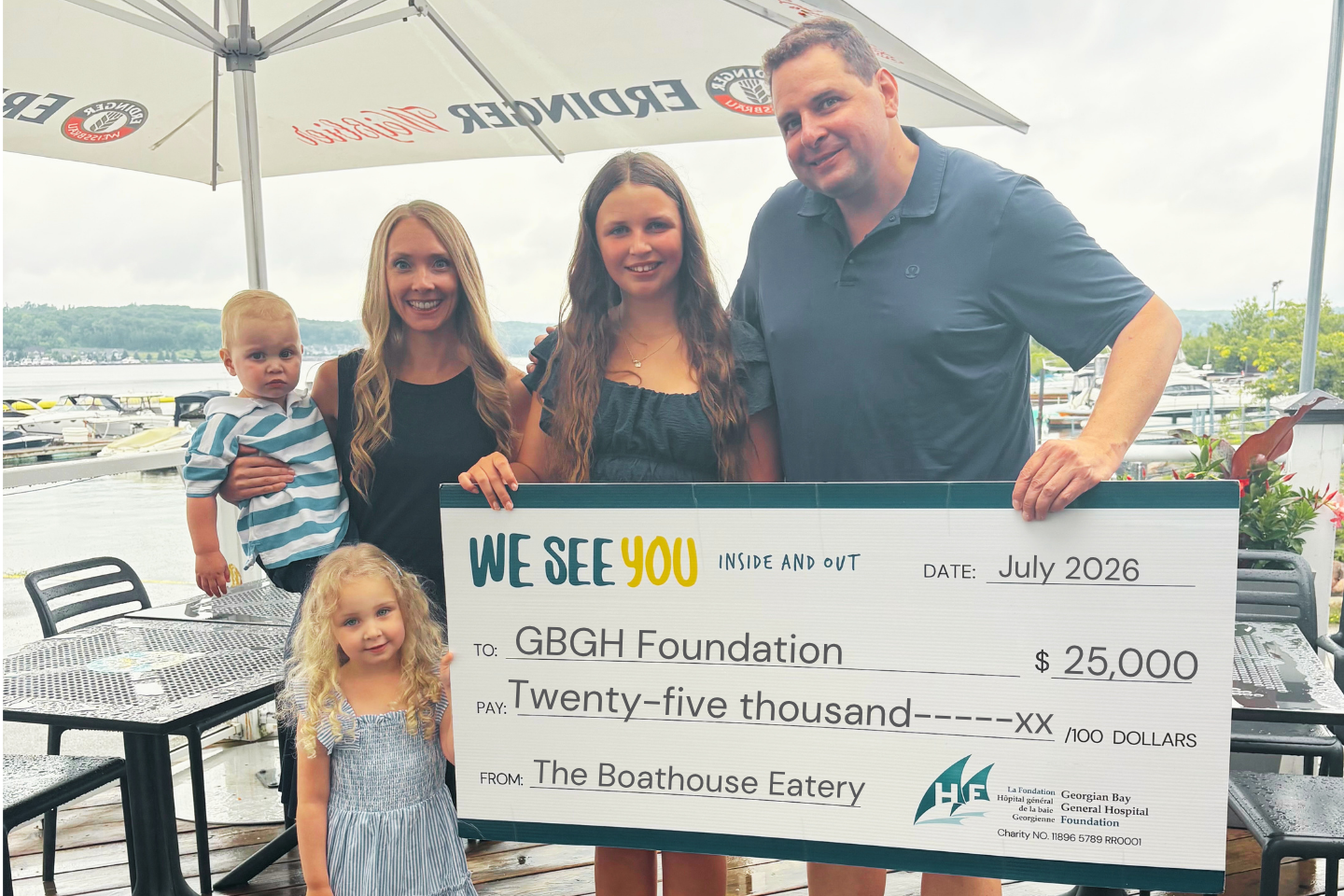 Owners of Boathouse Eatery, Kirk, Taylor and family present a cheque for $25,000 to the Foundation's We See You campaign in support of GBGH