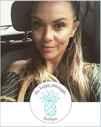 A blonde woman sitting in a car. The logo for The Happy Pineapple Boutique is below