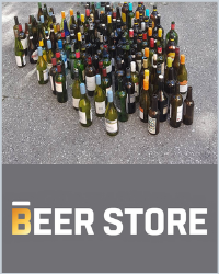 A bunch of wine and liquor bottles on the ground. The Beer Store logo in underneath