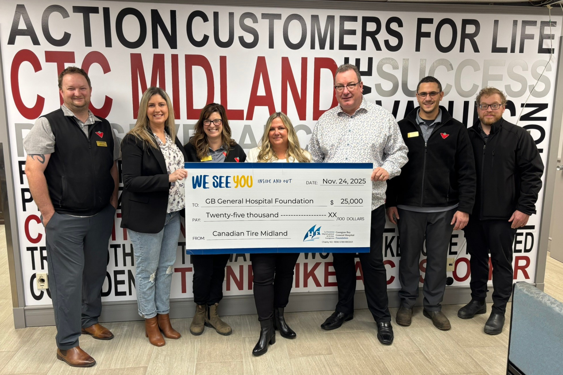 Canadian Tire leaders present first installment cheque of $25K out of $100K pledge to GBGH Foundation's We See You campaign.