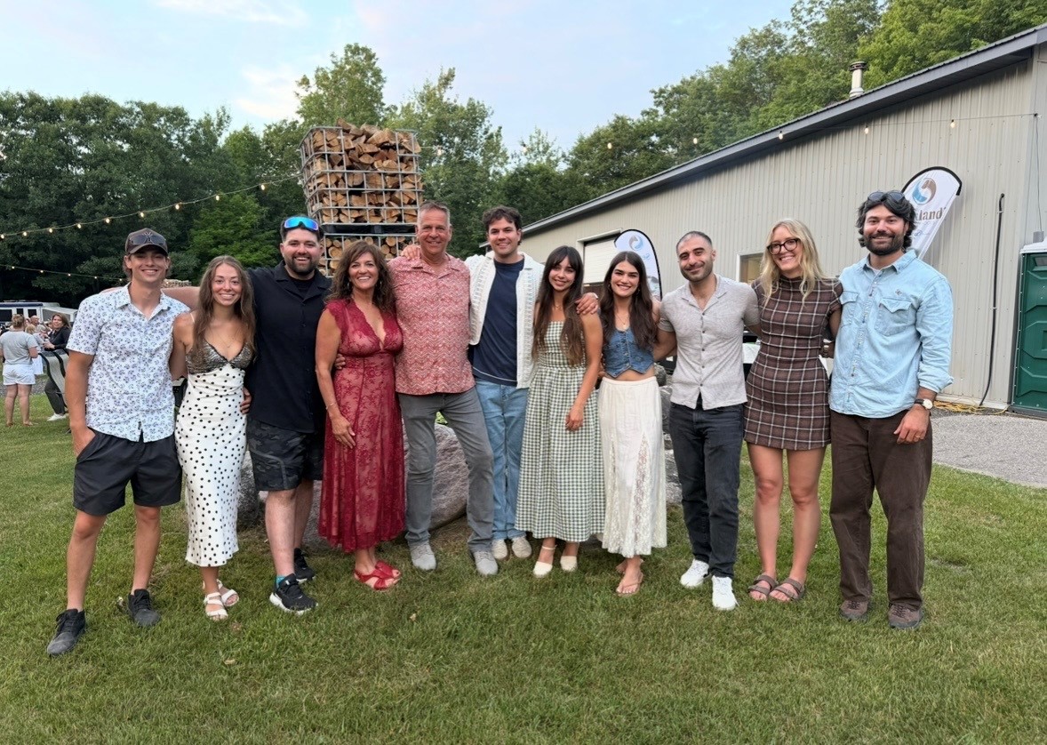 Sue Duquetter surrounded by her family at her milestone birthday celebration