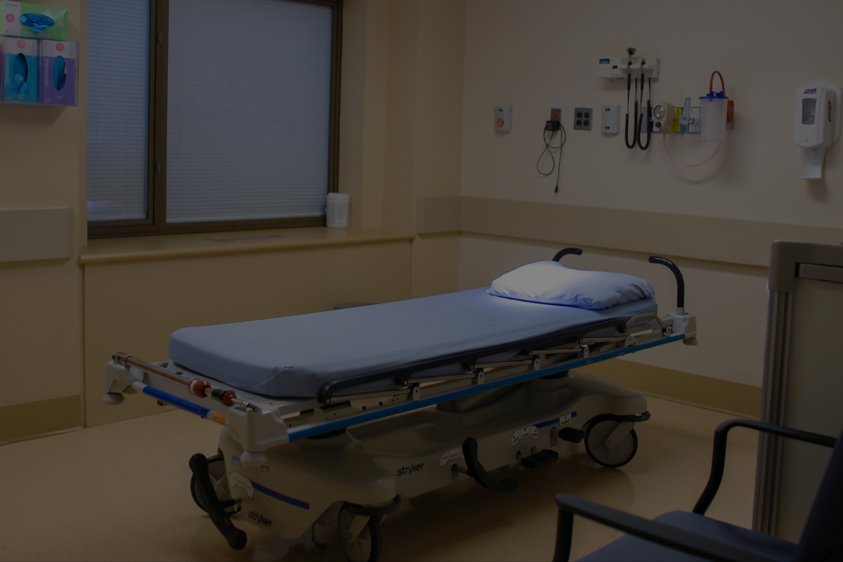 An empty stretcher in a un-used hospital room