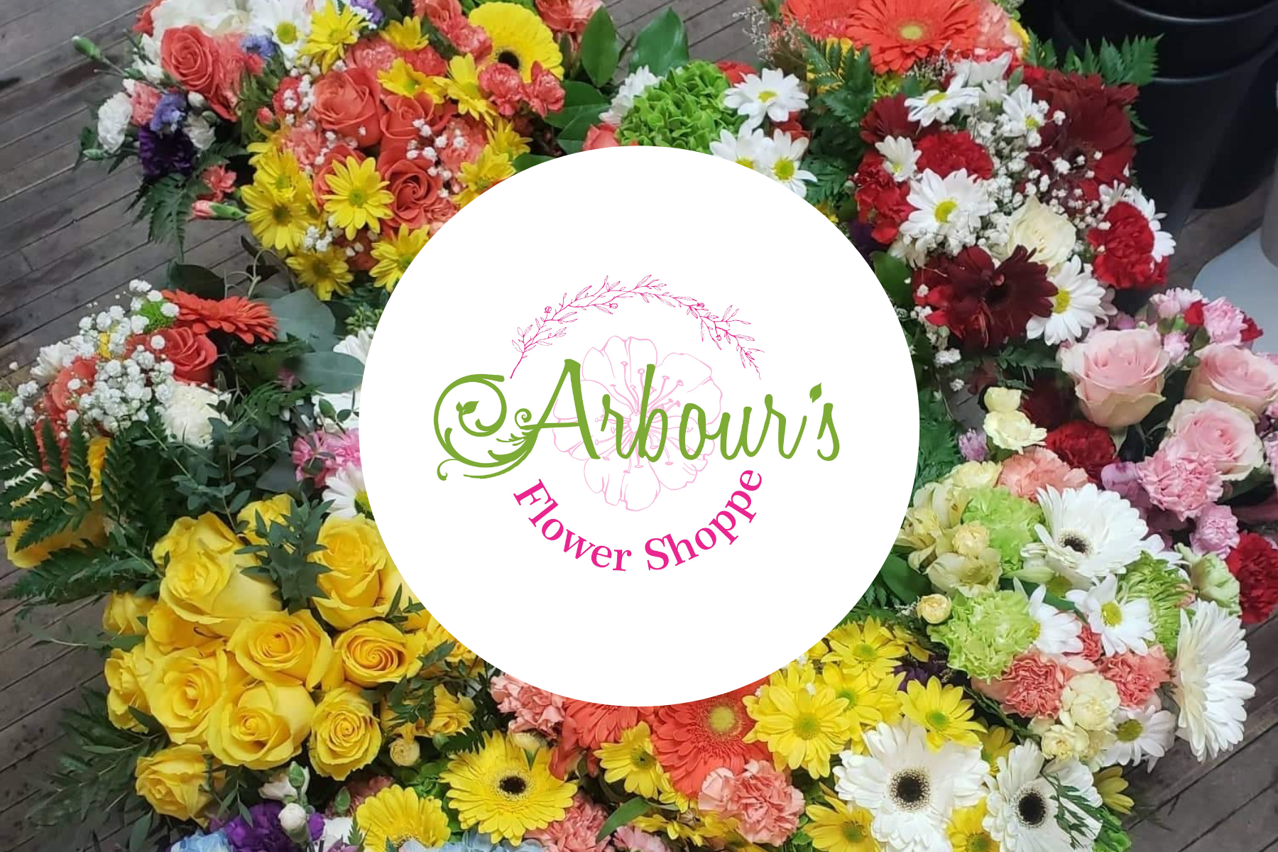 Arbours Flower Shoppe logo with colourful fresh bouquets surrounding it