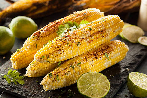 Five cobs of grilled corn on the cob