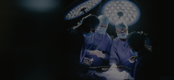 Four doctors and nurses in the operating room